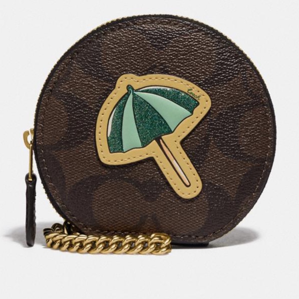 Coach Round Case Wristlet In Signature Canvas With Umbrella.